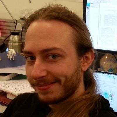 My image did not load. Imagine a smiling man with long blond hair.